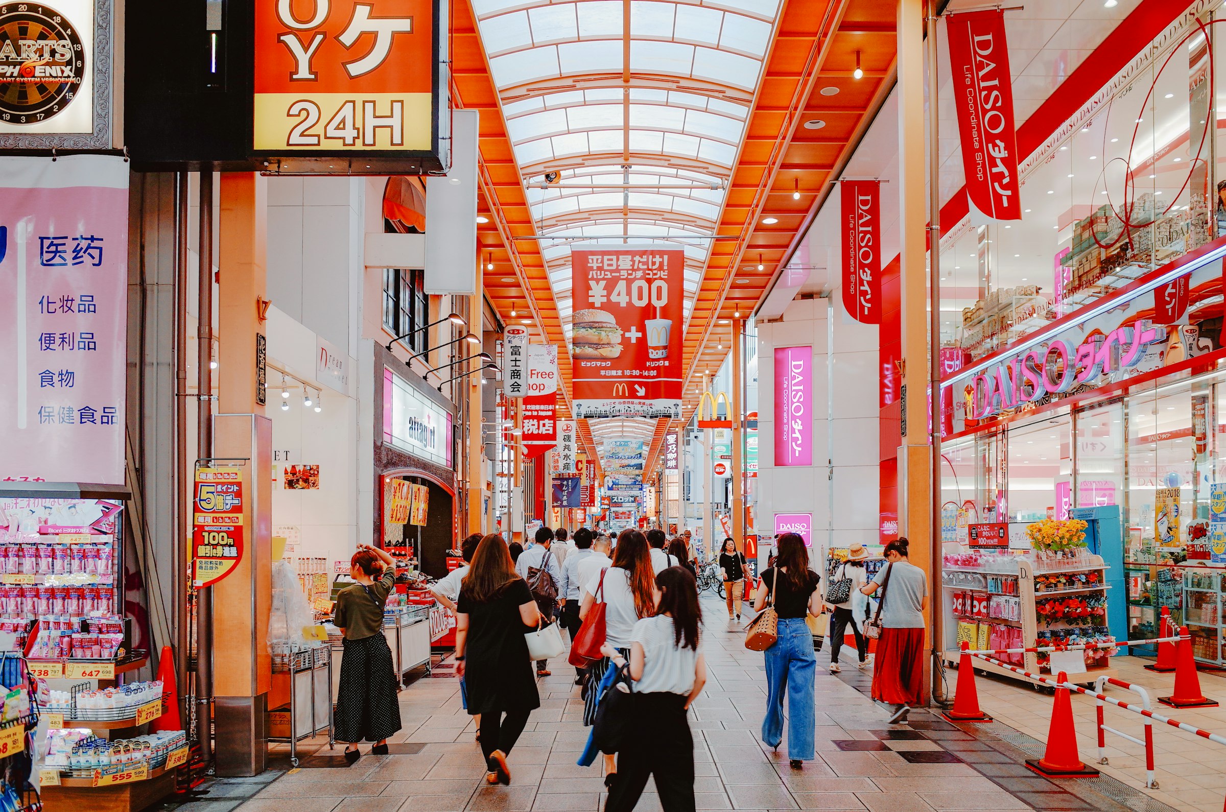 A busy covered shopping arcade in Osaka